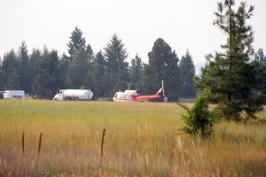 A helicopter and tanker are staged nearby at Farragut State Park for quick access. Photo by Ben Olson
