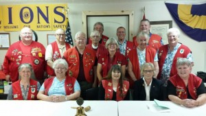 The Lions Club members. Back row (left to right): Sandpoint Chapter President Dave Bannister and Bill Lewis. Next row (left to right): George VanRossum, Wayne Henderson, Keith Leiber, and Tom Debrowski. Front standing row (left to right): Mike Reeb, Judy Debrowsky, Mary Leiber, and June Dull. Seated row (left to right): Claudia Bannister, Sandy VanRossum, Barbara Trudeau, Past Zone Chair Pat Nelson from Priest Lake, and Nancy  Lewis. Photo courtesy of the Sandpoint Lions Club.