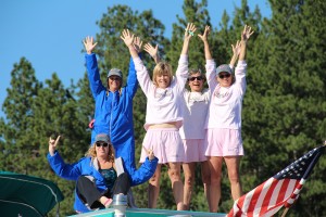 Five out of the six Mighty Mermaids celebrating on the support boat (Roni Hibben was swimming at the time of the photo). Photo by Ben Olson.