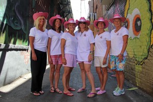 The Mighty Mermaids pose the night before the big swim. From left to right: Nancy Steadman Martin, Roni Hibben, Christie Ciraulo, Karen Einsidler, Jenny Cook, and Tracy Grilli. Photo by Ben Olson.