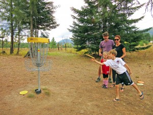 Rick Leader (back) stands with Shannon Williamson and her children Emmerson and Finn Epphard. Photo courtesy of Eureka Institute.