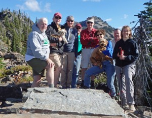 A group of supporters pose at the top of a group hike last Saturday. Photo by Phil Hough.