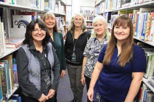 The lovely Library ladies, from left to right; Michelle Shorman, Teresa Sammartano, Library Director Ann Nichols, Susan Bates-Harbuck, and Amanda Ruff. Photo by Ben Olson.