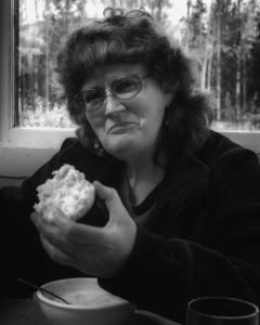 A woman at the Hoot Owl's Monday soup kitchen. Photo by William G. Rosch.