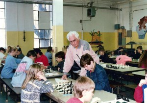 Lou Domanski looks over his budding chess prodigies at Southside Elementary School in 1990. Photo courtesy of Cassadie Spinney.