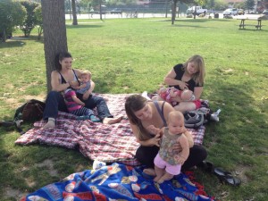 A trio of mothers breastfeeding at Travers Park in 2014. Photo by Angie Shadel.