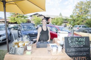 Tianna Valiani - Cultured Solutions Kombucha: Years at the Farmers Market:  one      “As a first-year member I found the Farmers’ Market to be very welcoming! The Sandpoint community is so loyal to the vendors and appreciates all of our products. It was so exciting to see the same faces each week. I really got to know the regulars and connect with them by sharing what we love.” Photo by Cameron Barnes 