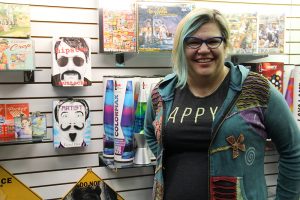 Julie Martin prepares for the grand opening of Zany Zebra on Saturday, Nov. 19. Photo by Ben Olson.