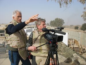 Director Terry Sanders, left, and cameraman Erik Daarstad, right, on location in Balad, Iraq while filming “Fighting For Life.” Courtesy image.